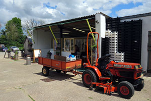 Our Kubota Tractor parked outside the Farm Shop in 2020 which we use to transport fruit from the orchard to the shop